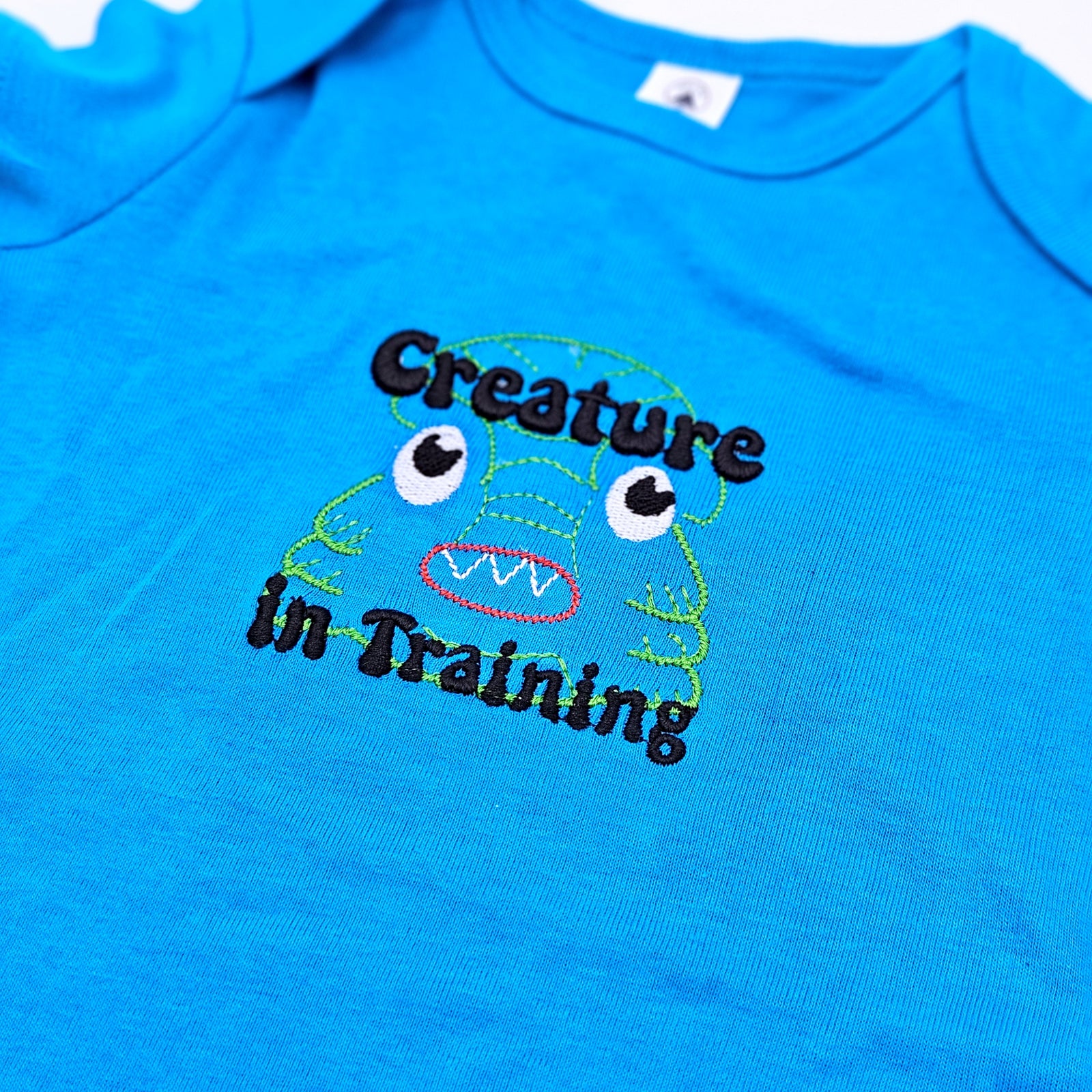 Creature in Training Baby Bodysuit Onesie