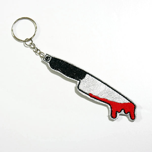 https://junkyardwitch.com/cdn/shop/products/knife-slasher-bloody-scary-keychain_600x.jpg?v=1658521793